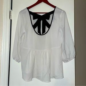 A. Byer Off-white Round Neck Chiffon Blouse with Cut out Back Statement Bow